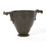 After Henri Cailleux (1854-1925), a 19th century patinated bronze two-handled cup.