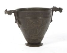 After Henri Cailleux (1854-1925), a 19th century patinated bronze two-handled cup.