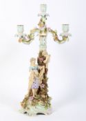 A late 19th century German porcelain four light Meissen-style candelabra.