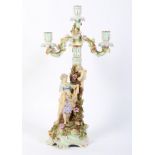 A late 19th century German porcelain four light Meissen-style candelabra.