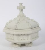 An ecclesiastical portable Parianware baptism font with cover. H21cm.