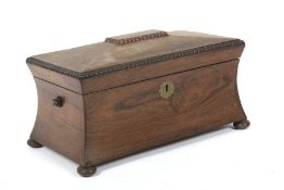 A William IV rosewood waisted rectangular tea caddy.