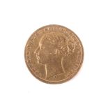 A 1872 young Victorian gold sovereign coin.