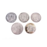 Five silver crown-sized coins.