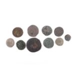 Ten Roman coins.