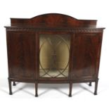 A late 19th century mahogany bow fronted display cabinet.