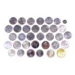 34 world coins, mainly crown size. Including a USA 1878 silver dollar.