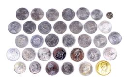 34 world coins, mainly crown size. Including a USA 1878 silver dollar.