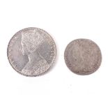 Two coins. 1849 florin and 1746 Lima sixpence.