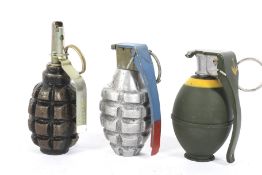 A collection of three inert hand grenades