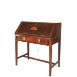 A 19th century mahogany inlaid Sheraton desk on stand.