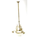 A large brass hanging chandelier.