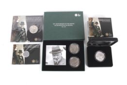 Four sets of Winston Churchill presentation coins.
