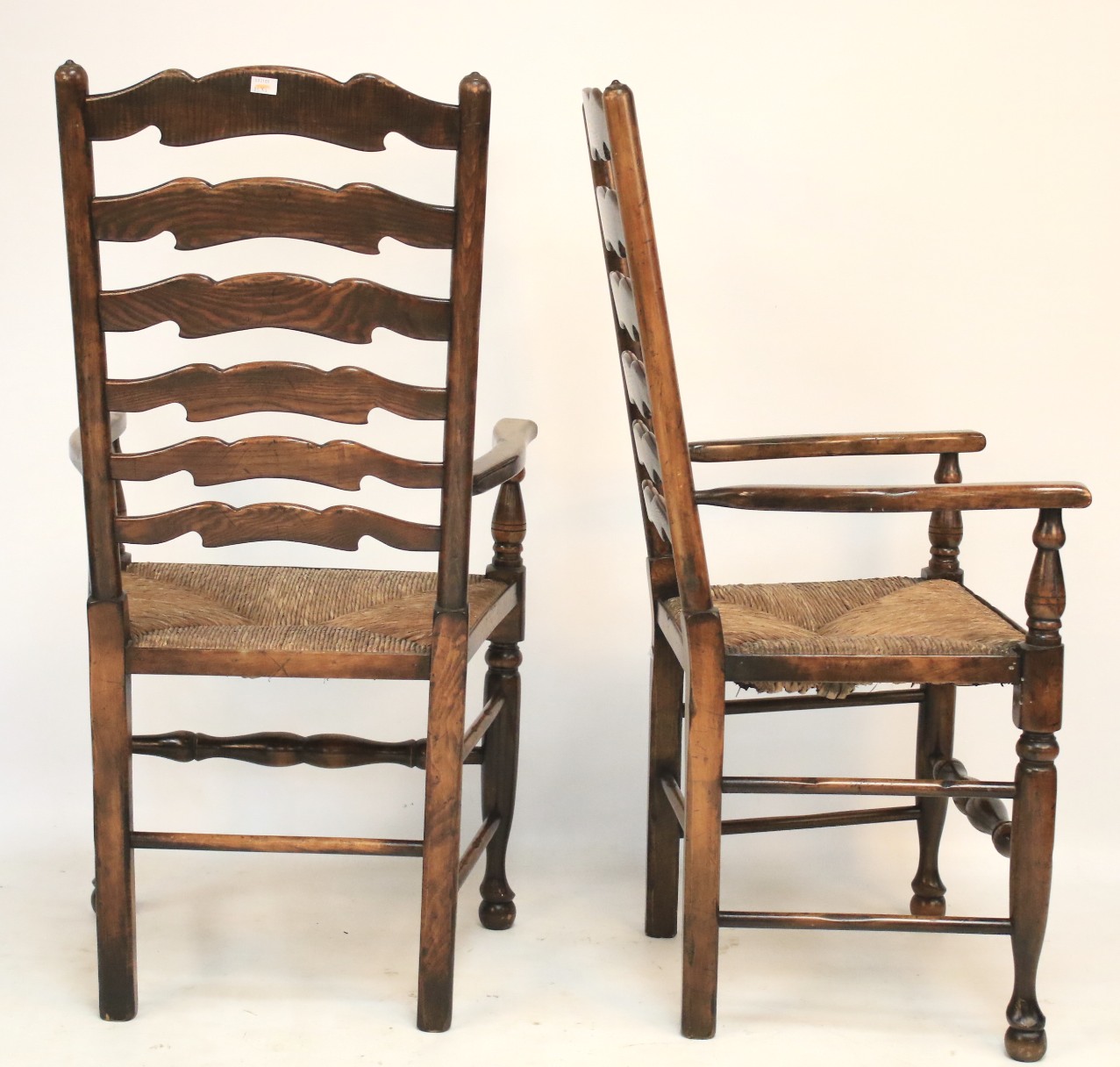 A pair of provincial rush seated ladder back armchairs. - Image 2 of 2