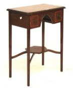 An Edwardian mahogany two drawer side table.