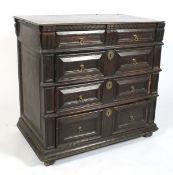 A 17th century oak chest of drawers.