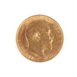 A 1902 gold sovereign coin.
