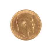 A 1902 gold sovereign coin.