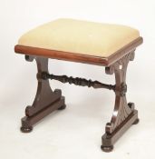 A 19th century mahogany piano stool.