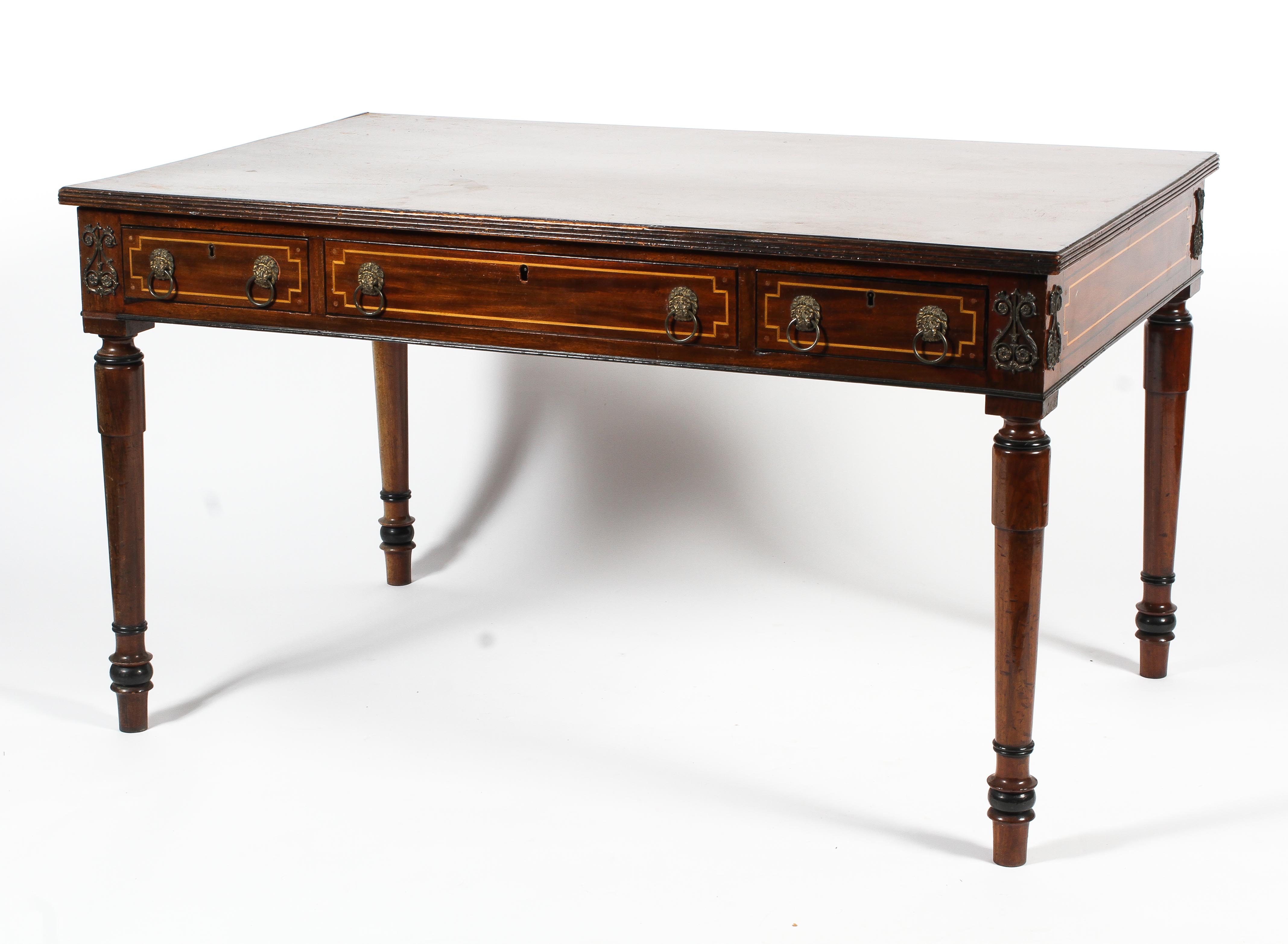 A Regency style mahogany writing table.