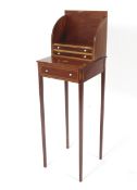 An Edwardian inlaid mahogany miniature desk.