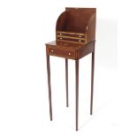 An Edwardian inlaid mahogany miniature desk.