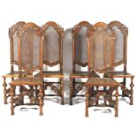 Set of six carolean cane back walnut chairs. With carved arched top rail and cane backs and seats.