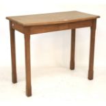 An ecclesiastical oak bow fronted side table.