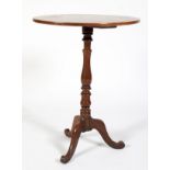 An early 20th century mahogany pedestal wine table.