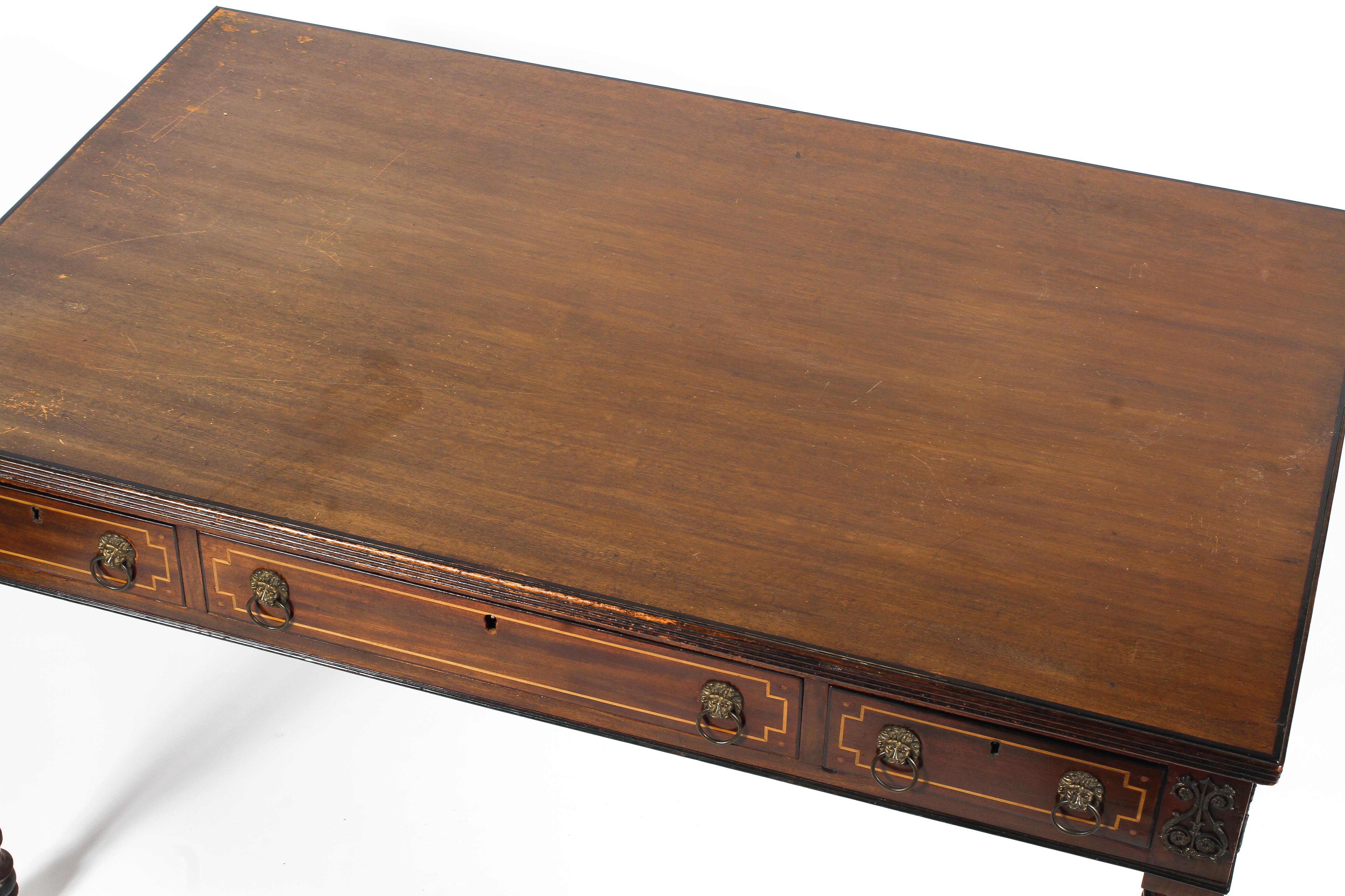A Regency style mahogany writing table. - Image 2 of 3