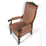 A 19th century rosewood elbow chair.