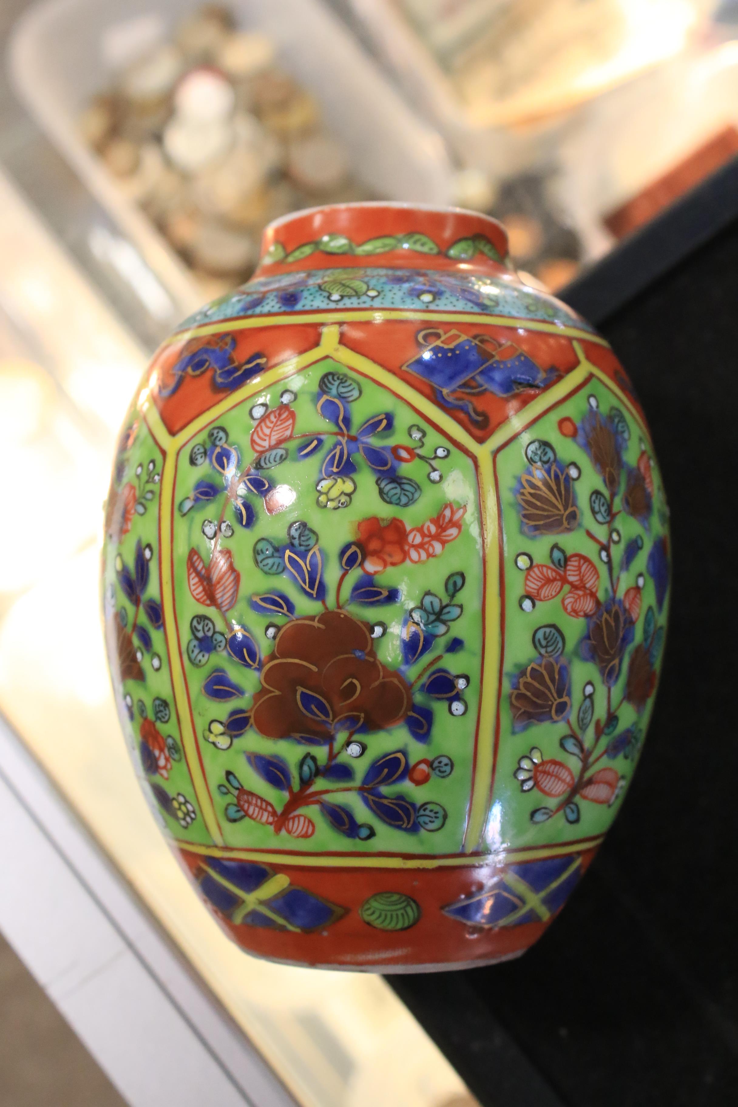 A Qing Dynasty porcelain oviform vase and cover. - Image 7 of 15