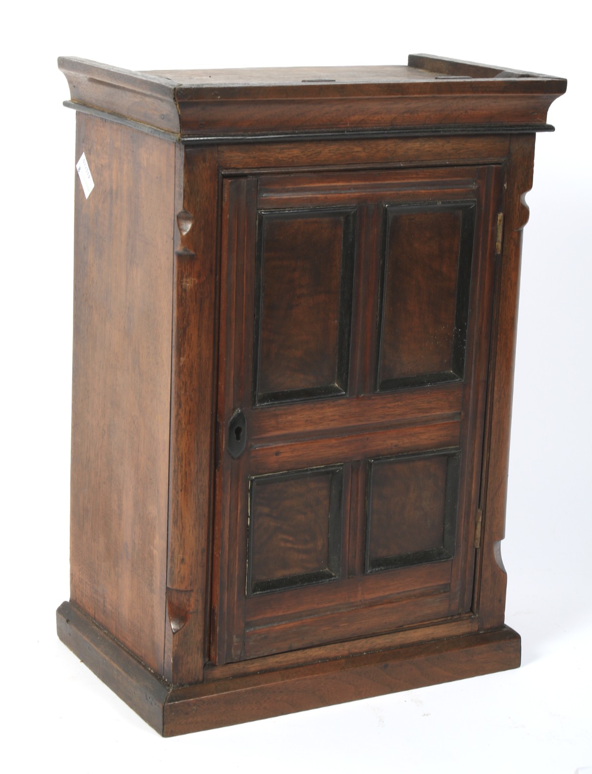 A 19th century mahogany table top cabinet in the form of a cupboard.