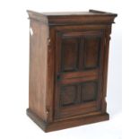 A 19th century mahogany table top cabinet in the form of a cupboard.