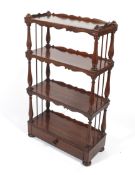A Victorian mahogany four tiered whatnot.