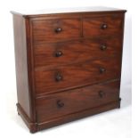 A Victorian mahogany chest of two short over three long graduating drawers.