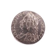 A 1758 shilling coin.