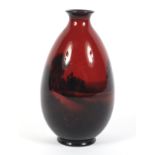 A Royal Doulton flambe tapering oviform vase.