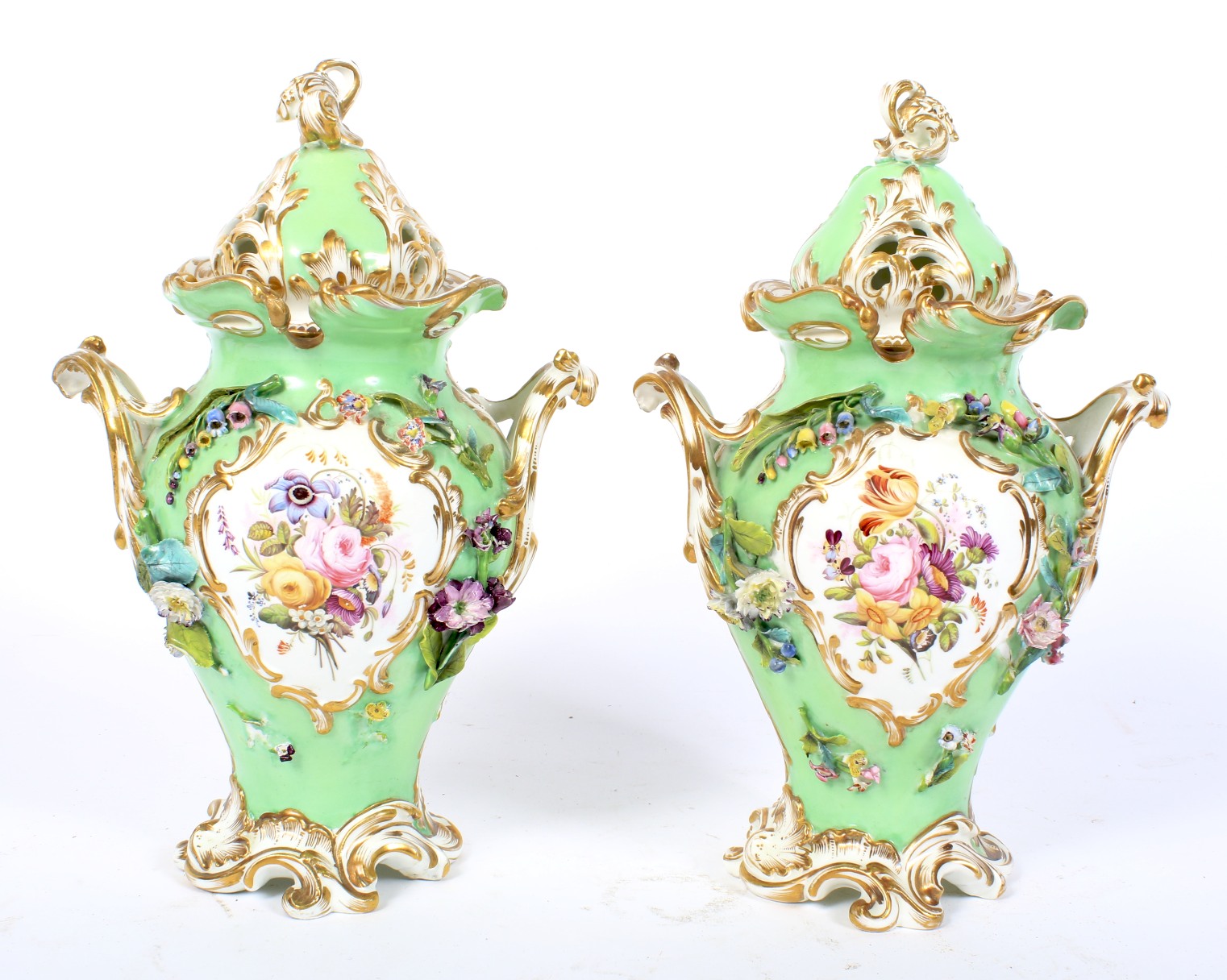 A pair of 19th century Coalport green-ground baluster pot-pourri vases and domed covers.