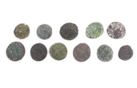 Eleven Roman coins.