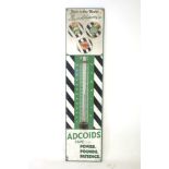 An original enamel Ducham's Adcoids engine oil and thermometer sign.