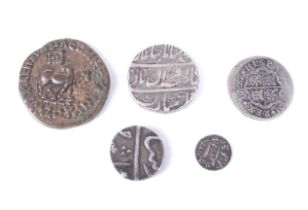 Four Indian coins and a Spanish 1727 1 real coin.