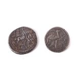 Two Roman silver coins.