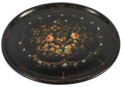 A Victorian black lacquered oval tray.