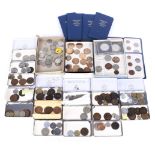 Assorted world coins including some silver.