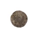 A Henry VIII groat coin.