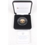 A 2017 22ct gold proof £1 coin, 8g, in box.