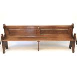 A 19th century oak church pew.