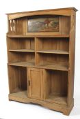An oak Arts and Crafts free standing bookcase cupboard by Shapland & Petter.