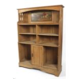 An oak Arts and Crafts free standing bookcase cupboard by Shapland & Petter.